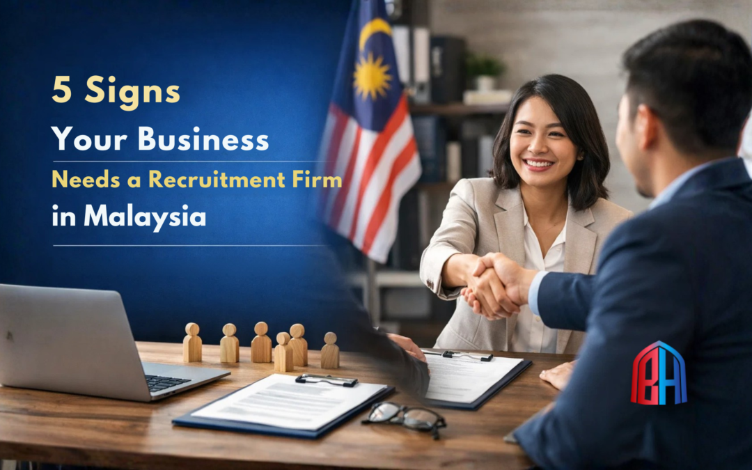 Recruitment firm in Malaysia helping businesses solve hiring challenges, showing HR professionals discussing talent acquisition and recruitment strategy